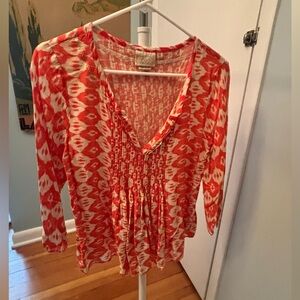 Chic Red and White Patterned Blouse